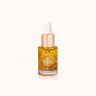 Clear glass bottle of Indulgeo Essentials Rose Gold Oil with 24k gold flakes and dropper with gold collar, 15ml size, front view.Best 24k gold facial oil for glowing skin India, Indulgeo Essentials rose gold oil bestseller Nykaa, natural glowing face oil serum before makeup, gold flake face oil for radiant skin, chehre par glow lane wala gold oil, Indulgeo rose gold elixir 15ml, moisturizing facial oil for dry skin glow.